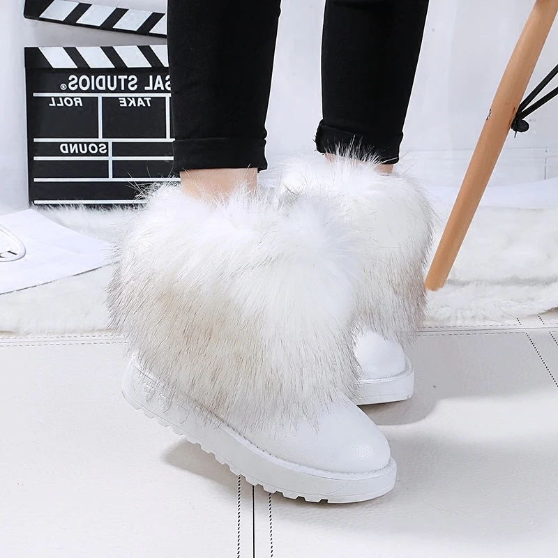 

The winter of 2017 thick soled  a female fox one hair white snow  furry  shoes warm Muffins boots