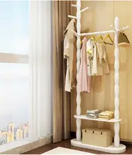 Coatrack ground solid wood home to hang clothes. The bedroom shelf.