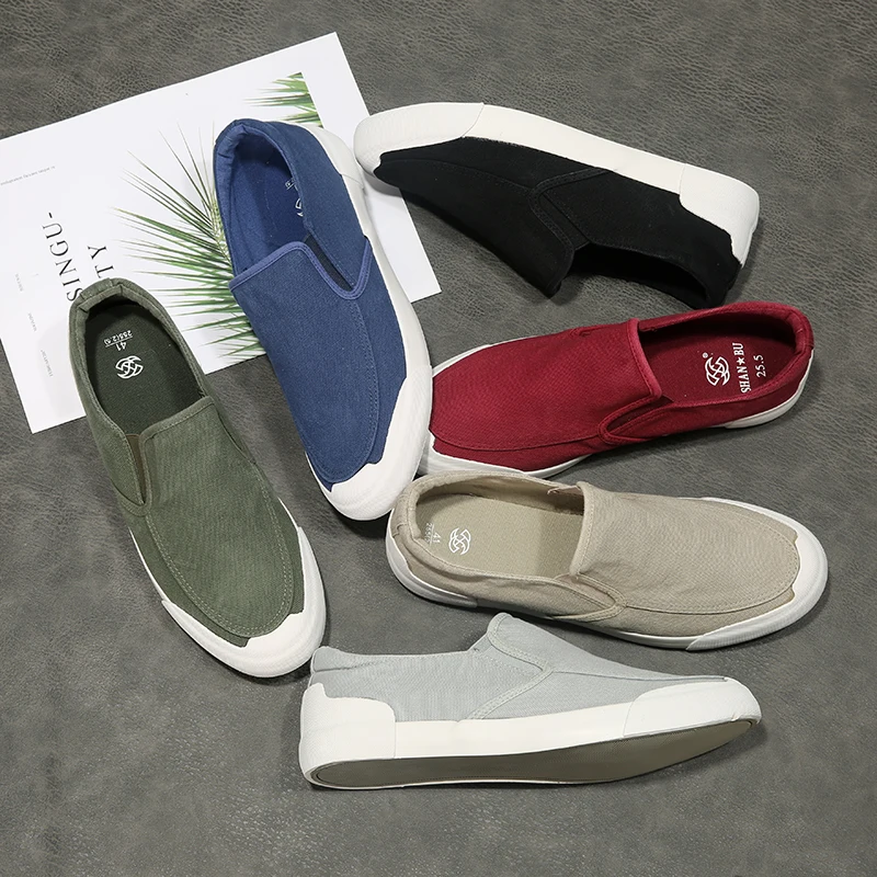 

Spring and autumn new men's canvas shoes a pedal casual shoes wild casual lazy shoes fashion shoes Korean version of the tide