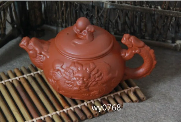 

Yixing purple clay teapot embossed handmade teapot double dragon pot 400 ml
