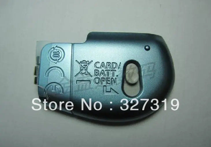 

New Original OEM SILVER battery door COVER For the Canon A1100 camera
