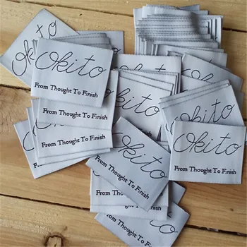 

Custom private logo washable cloth cursive Jacket white woven label 50 mm * 38 mm