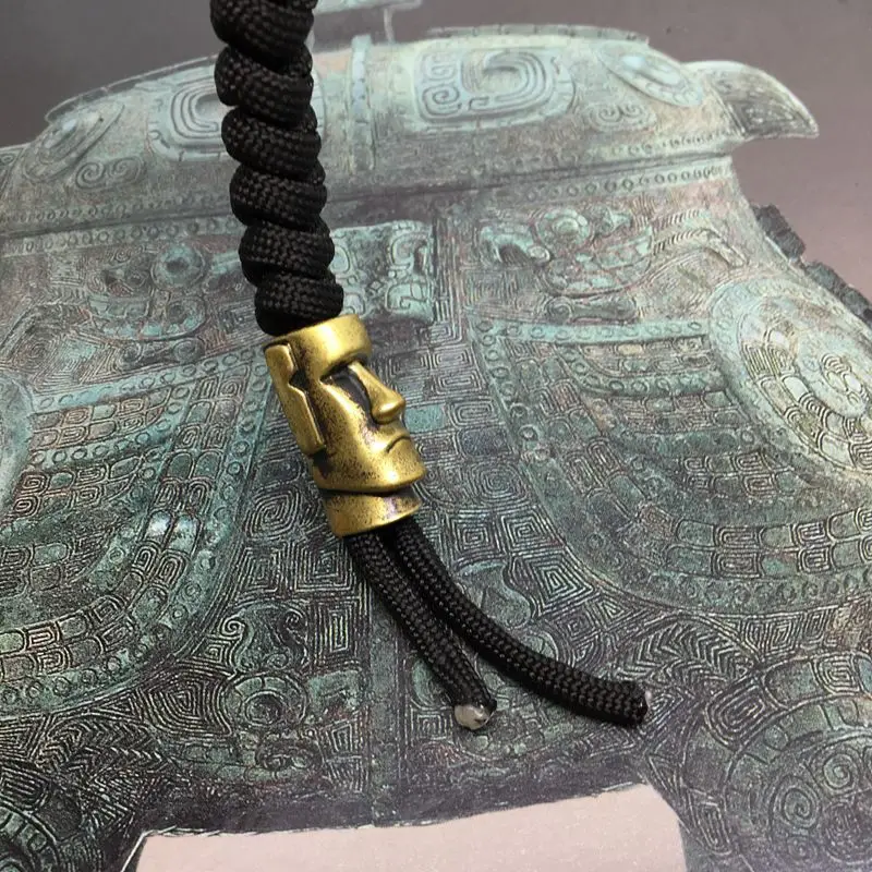 EDC-Pocket-Tools-Personalized-Creative-Brass-Paracord-Knife-Beads-Easter-Island-Stone-Statue-Watchman-Knife-Fall (1)
