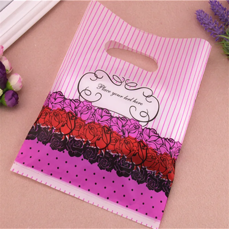 2016 New Design Wholesale 100pcs/lot 20*25cm Mixed Luxury Flower Plastic Packaging Bags With Handles Favor Wedding Gift Bags