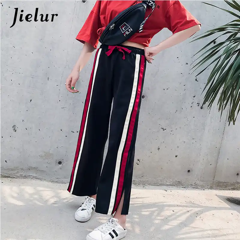 white trousers red stripe