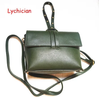 

Lychician brand Woman mini bucket bag shoulder bag,handbag, tote high quality PU leather,good shape, rivet decoration