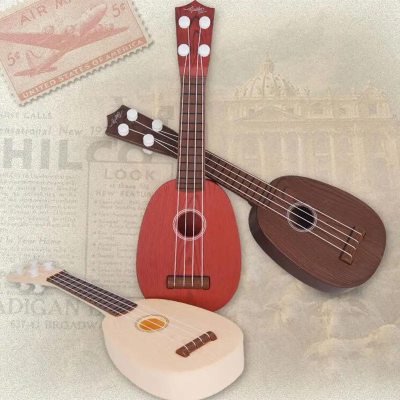 4 Strings Musical Plastic Toy Ukulele Small British style children's Guitar | Спорт и развлечения