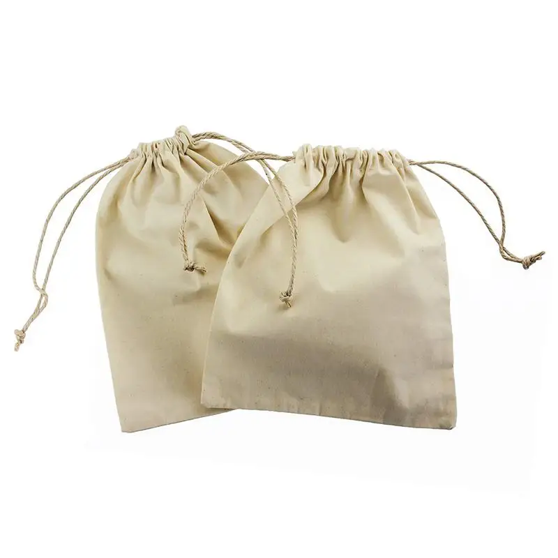 12 хлопковых сумок с практичными завязками, размером приблизительно 15x10 см