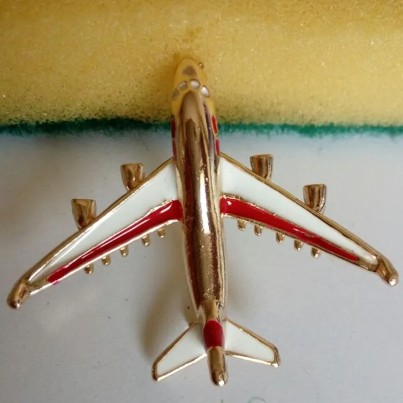 

Stylish cute little plane brooch blue enamel gold metal brooch exquisite model fighter lady corset and men's suit accessories