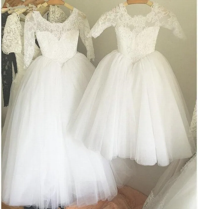 

Girls First Communion Gowns Long Sleeves Lace Appliques V-Back Covered with Buttons New Cheap Flower Girl Dress Custom Made Long