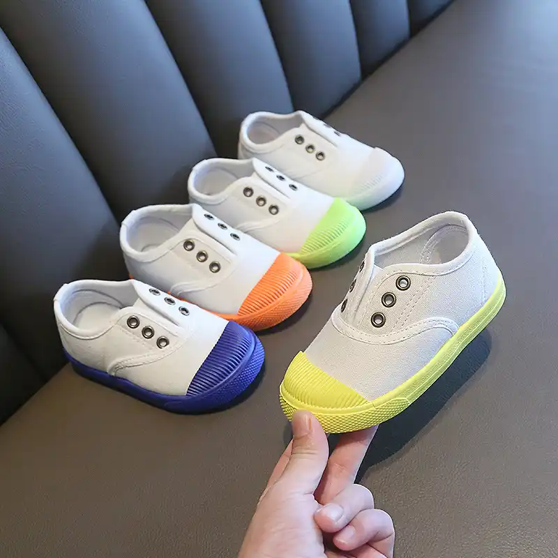little girl white canvas tennis shoes