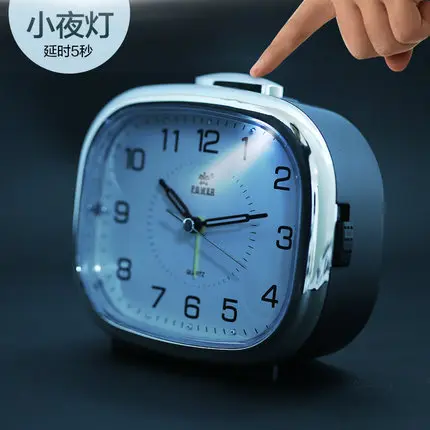 

Creative music small alarm clock, the head of a bed night light lazy student children bedroom quiet fashion clock.