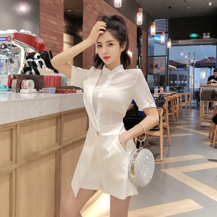 

Fashion short-sleeved Korean Lattice stitching slim wide leg Casual jumpsuit Single buckle Shorts Romper