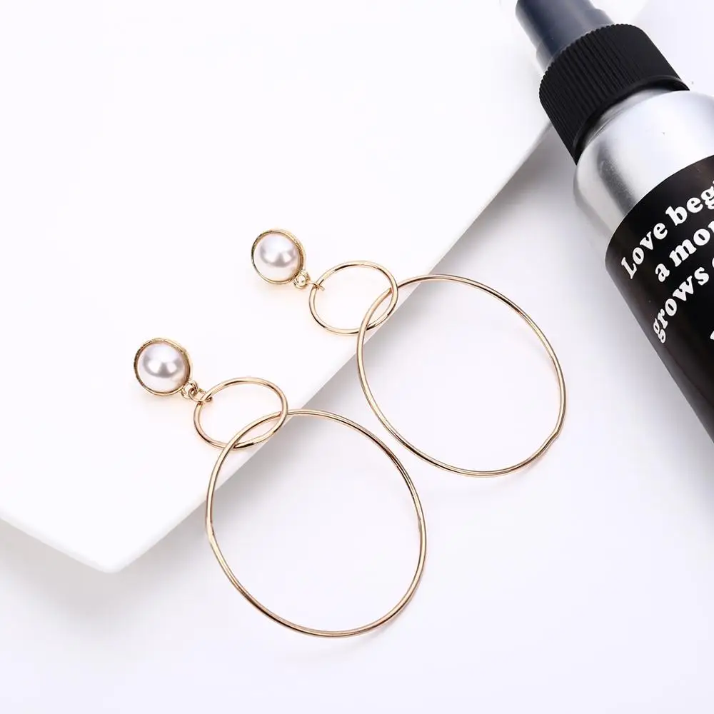 

Simple business hundred lap ear decoration metal hanging ring pearl ear nail