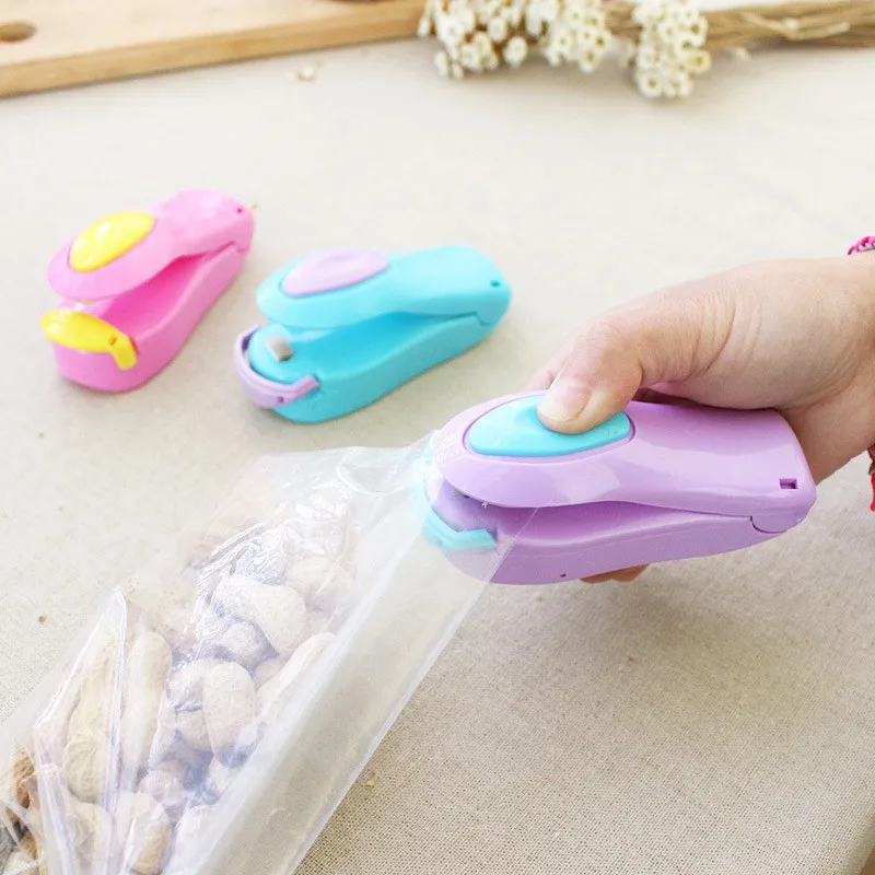 

Portable Mini Candy Colored Plastic Bag Sealing Machine Snacks Travel Hand Pressure Heat Sealing Machine Free Shipping