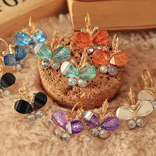 Женские серьги пусеты с крыльями 5 цветов стразы фиолетовый бант