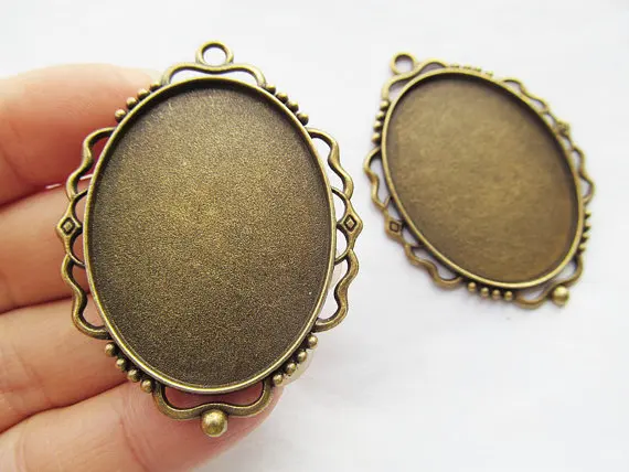 

20pcs Antique Silver tone/Antique Bronze Oval Hollow Base Setting Tray Bezel Pendant Charm/Finding,Fit 30mmx40mm Cabochon/Cameo