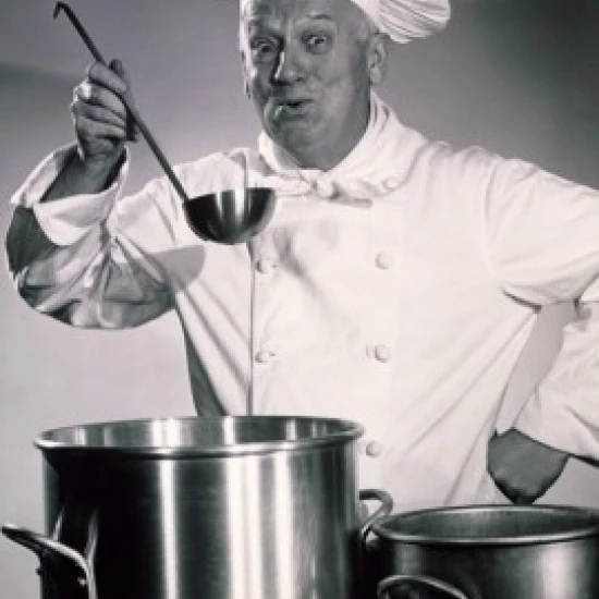 Portrait of a chef tasting food Poster Print (24 x 36)