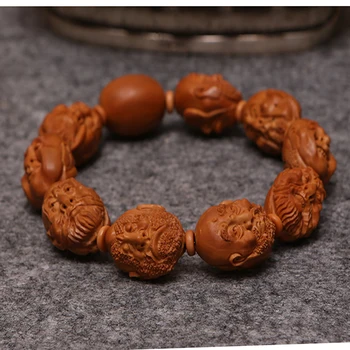 

Hand carved olive seed beads bracelet arhat buddha head religion bracelet for men
