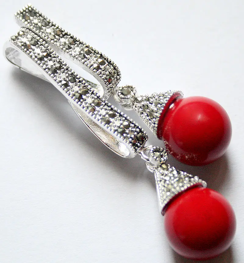 

Подвеска marcassite из серебра 925 пробы с красным кораллом, 12 мм, 58*20 мм