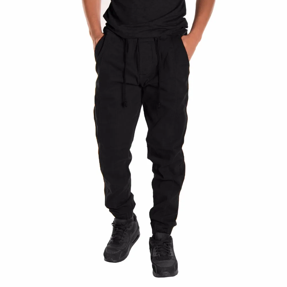 

HOT 2019 Outdoor Drawstring loose Male pure color Cargo trousers men tether elastic stitching Patchwork Beam Foot sweatpants