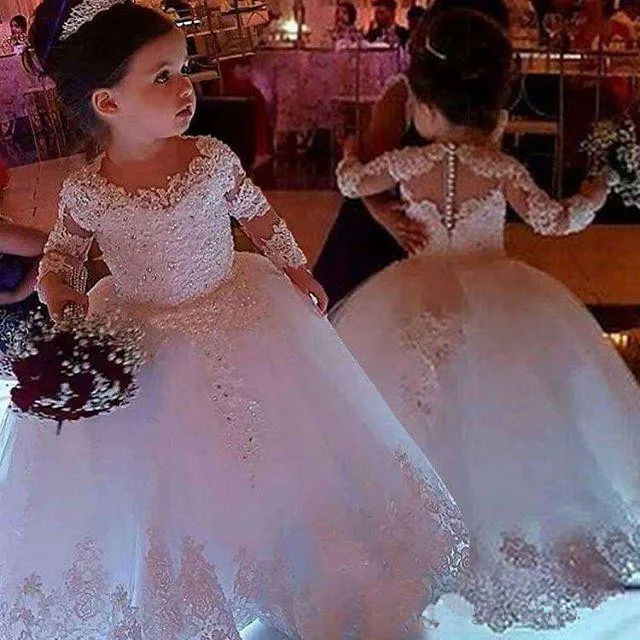 

2019 Cute Jewel Neck Flower Girls Dresses Long Sleeve Cover Button Puffy Tulle Lace First Communion Dresses Girls Pageant Gowns