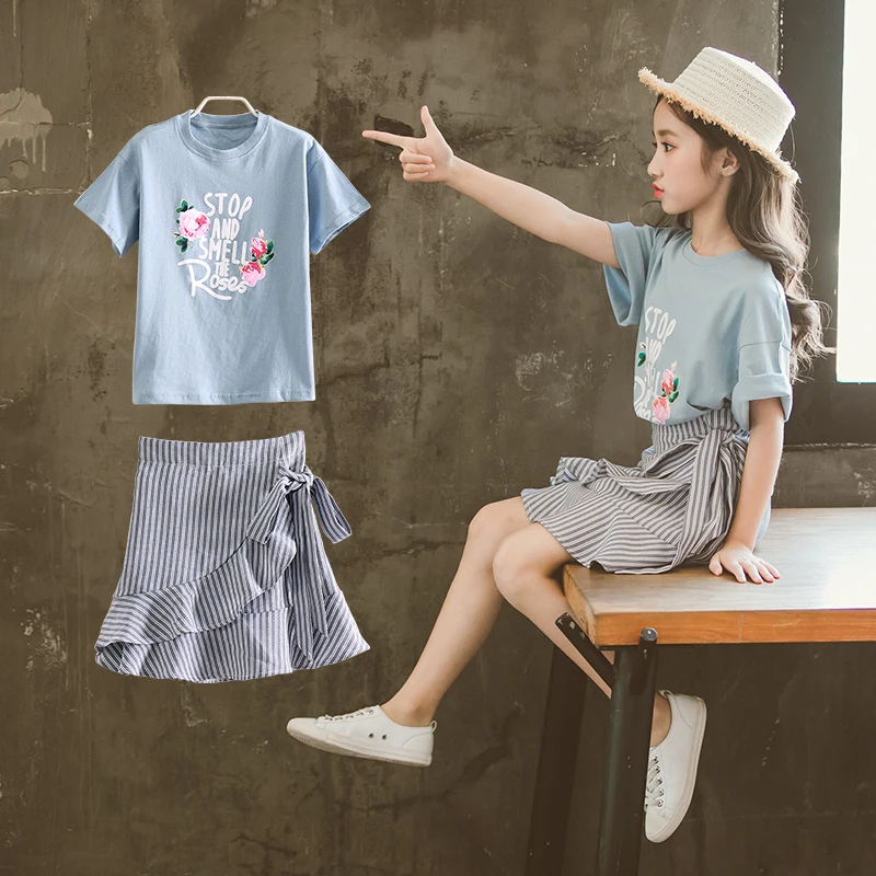 

Kids Clothes for Girls School Style Flower Print T-shirt Stripe Skirts Sports Suit Children's Cheerleading Clothing 2pc Sets