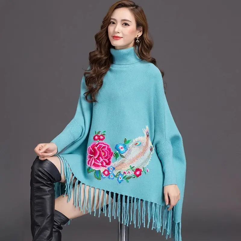 

Fashion new tassel hem cloak sweater shawl coat autumn and winter embroidered high collar pullover sweater female bat sleeve