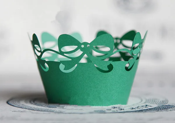 

Free Shipping green bow lace cupcake wrapper, paper laser muffin cake cup cups liners wedding wrappers decorating supplies