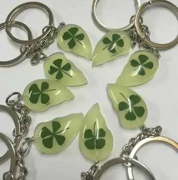 

Free Shipping 10 PCS fashion real Four Leaf Clover Noctilucent Handmade Keychain
