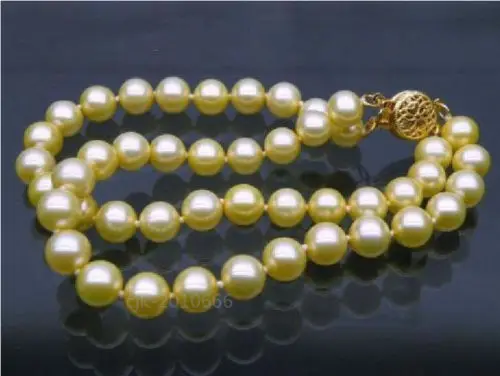 

shippinggenuine natural 8-9 mm gold yellow south sea pearl bracelet 5.25