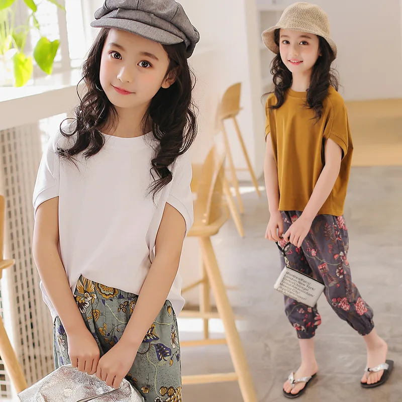

Children's suit 2019 summer new girls bat sleeve suit big children cotton linen pants pants two-piece 9475
