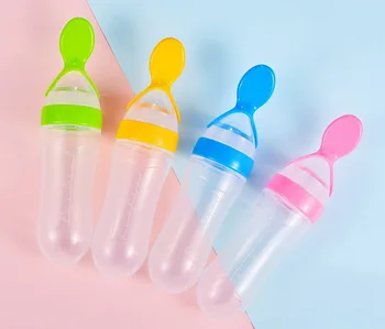 

DHL 50pcs Newborn Baby Squeezing Feeding Bottle Silicone Training Rice Spoon Infant Cereal Food Supplement Feeder