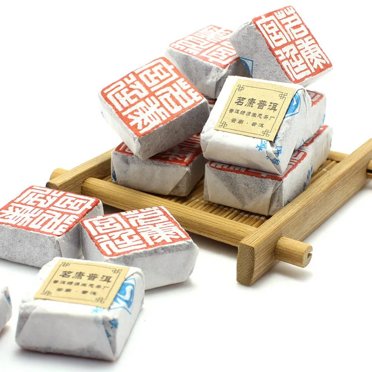 

Kang Ming court in Yunnan Pu'er tea small cubes cooked in bulk wholesale vintage tea flavor Specials
