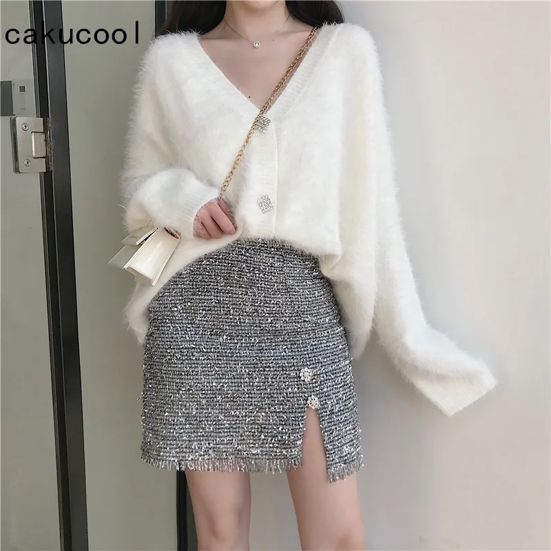 

Cakucool Spring 2 Piece Set Women Long Sleeve V neck White Sweater Shiny Silver Lurex Mini Skirt Set Korean Sweet Conjunto Femme