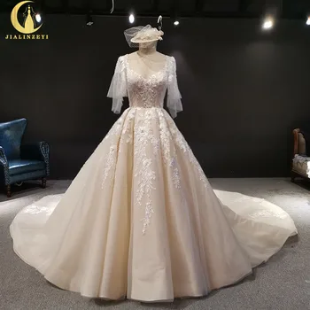 شراء2019 الراين مثير ريال الصورة نصف الأكمام الرباط يزين مع الخرز V الرقبة فاخر ألف خط قطار طويل الدانتيل يصل الزفاف فساتين