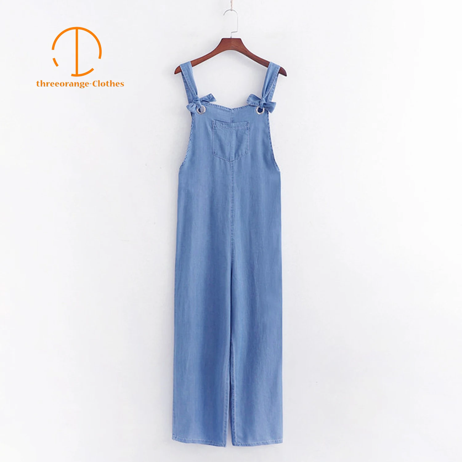 

Fashion Loose Denim jumsuits women adjustable Bow shoulder straps Front pocket Design lateral hollow out Casual summer jumpsuits