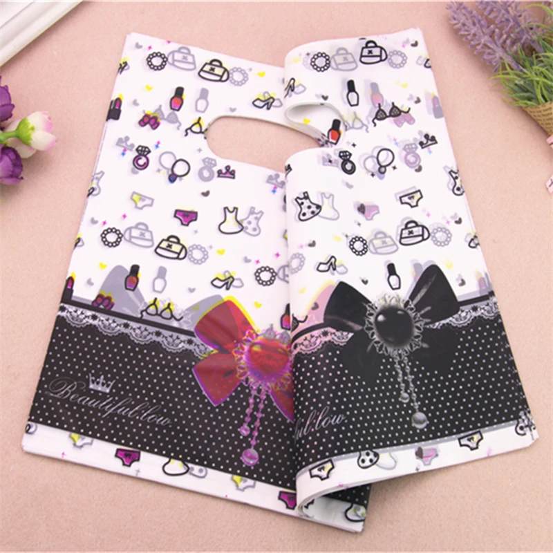 2016 New Design Wholesale 100pcs/lot 20*25cm Fashion Pink Luxury Plastic Bags With Love Heart Birthday Gift Packaging Bags