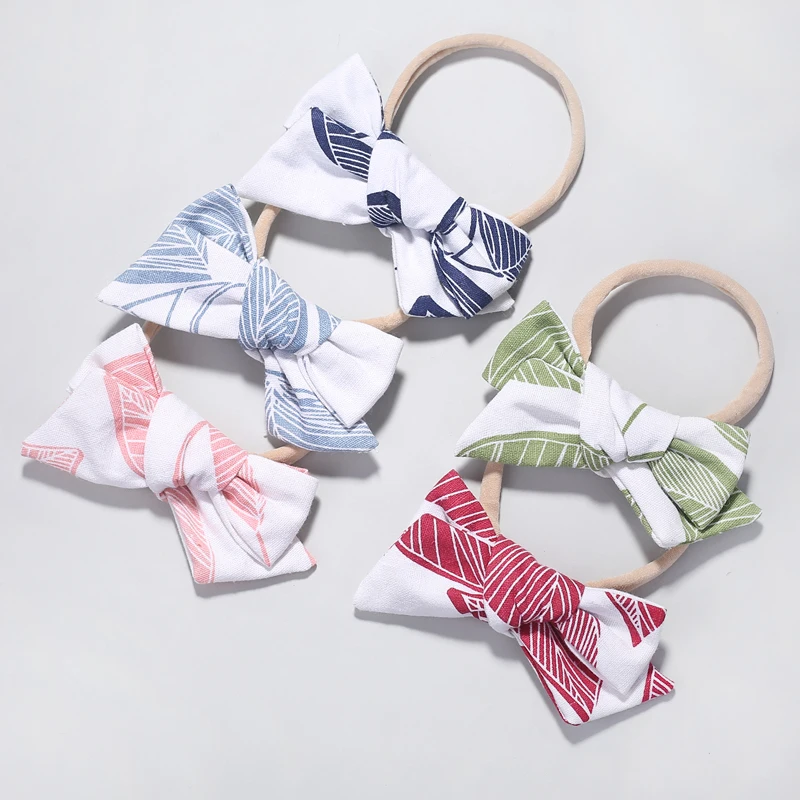 

4pcs/lot Cute Toddler Girls Leaf Print Bows Nylon Headbands Fashion Soft Cotton Bowknot Girls Elastic Nylon Head Bands Hair wear
