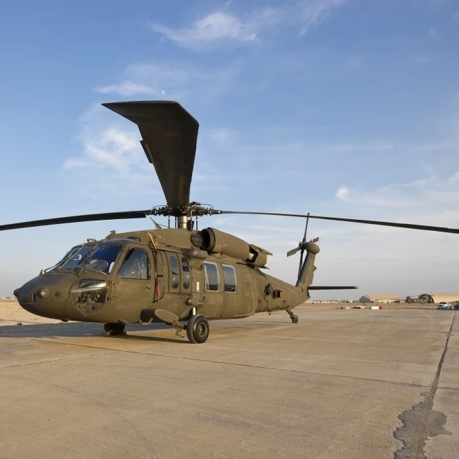 A UH-60 Black Hawk helicopter at Camp Speicher  Iraq Poster Print (34 x 23)