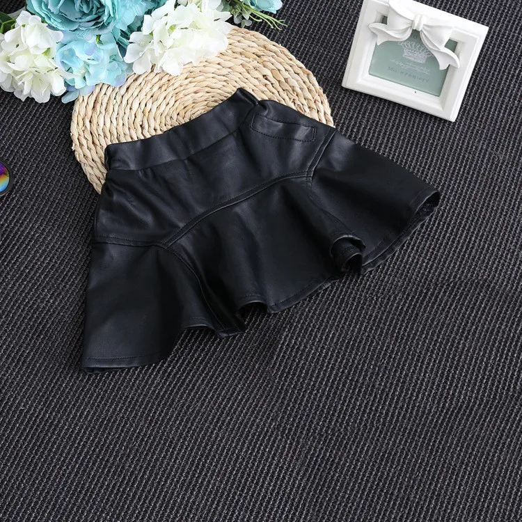 Модная детская юбка, новые весенние одноцветные юбки из искусственной кожи для девочек, детская черная короткая рубашка