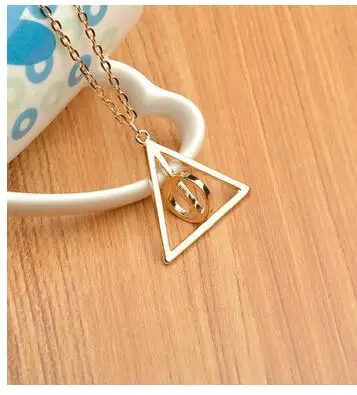 

FreeShipping The deathly hallows pendant necklace luna resurrection stone can rotate the triangle pendant