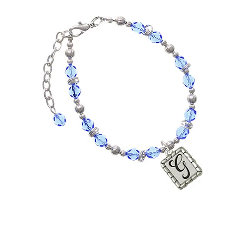 Silvertone Pebble Border Initial - G Light Blue Beaded Bracelet