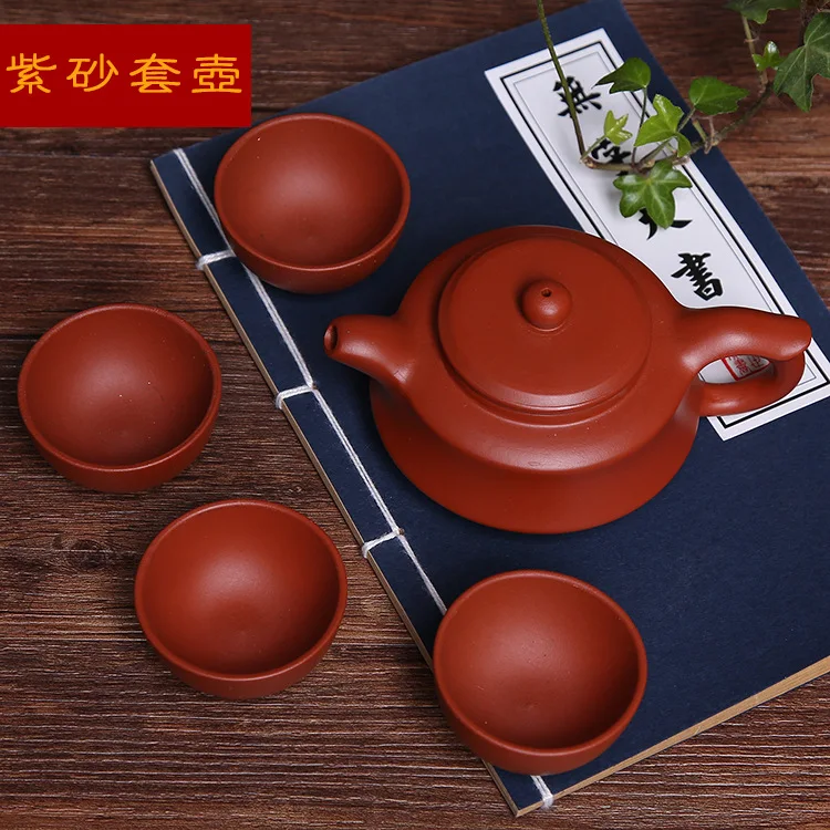 

Free Shipping Yixing Purple Clay Tea Set Zisha Kung Fu tea Pot with 4 small tea taste cup set wholesale tea sets gift