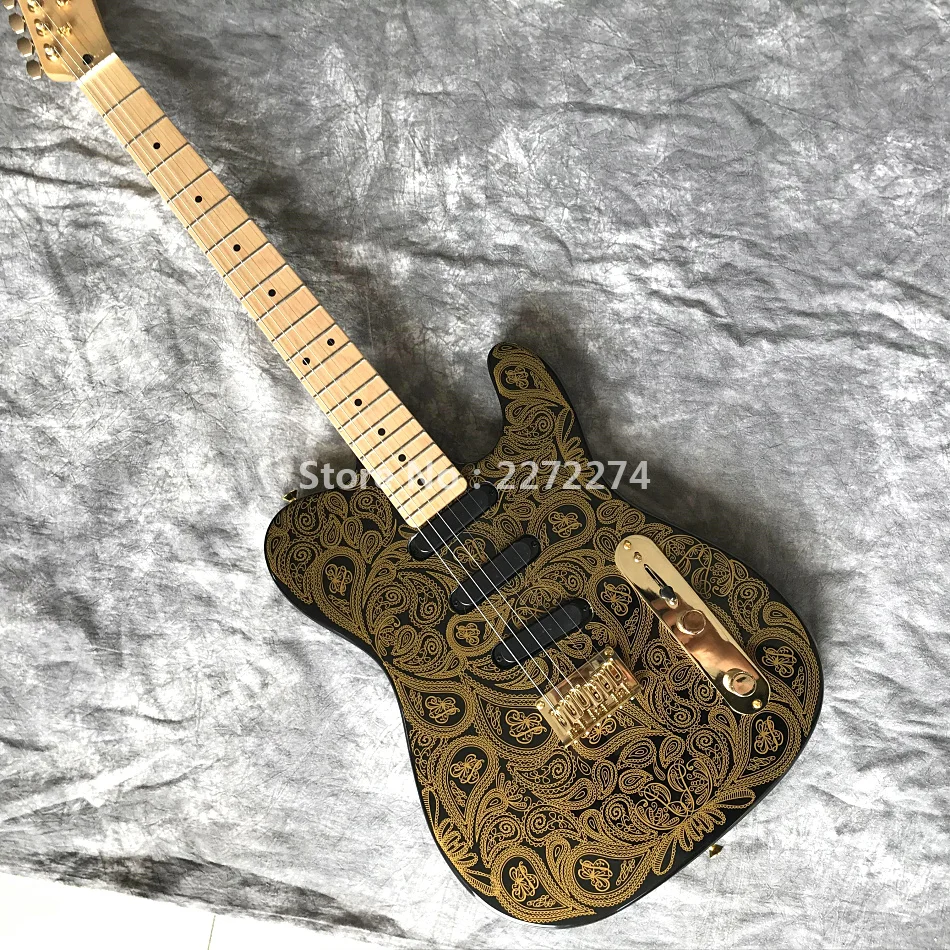 

New electric guitar, maple fingerboard, golden accessories.