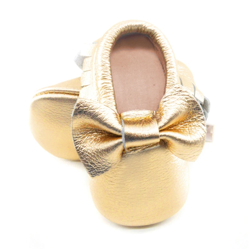 gold baby moccasins
