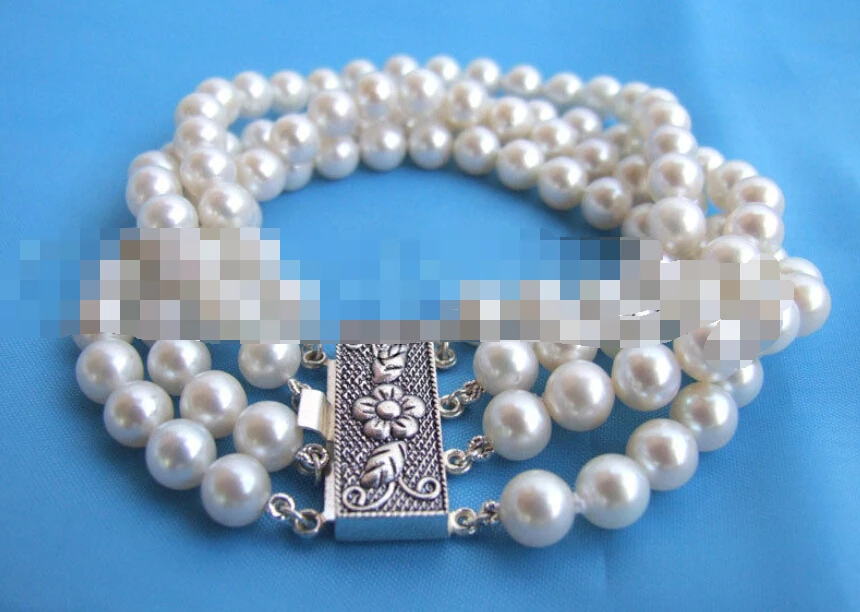 

0744 4row 8" white round freshwater pearl bracelet