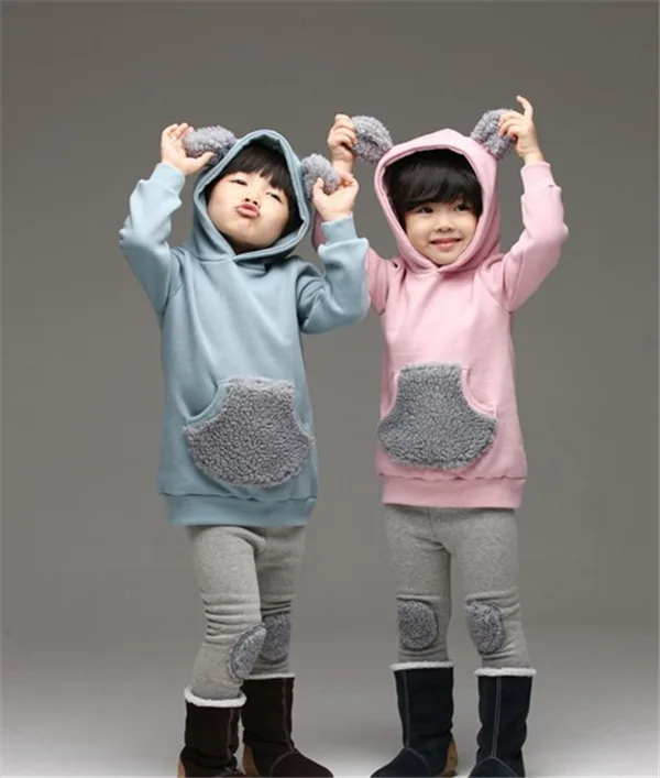 

In the fall and winter color matching pocket hooded thickening warm fleece children Male and female children's clothing