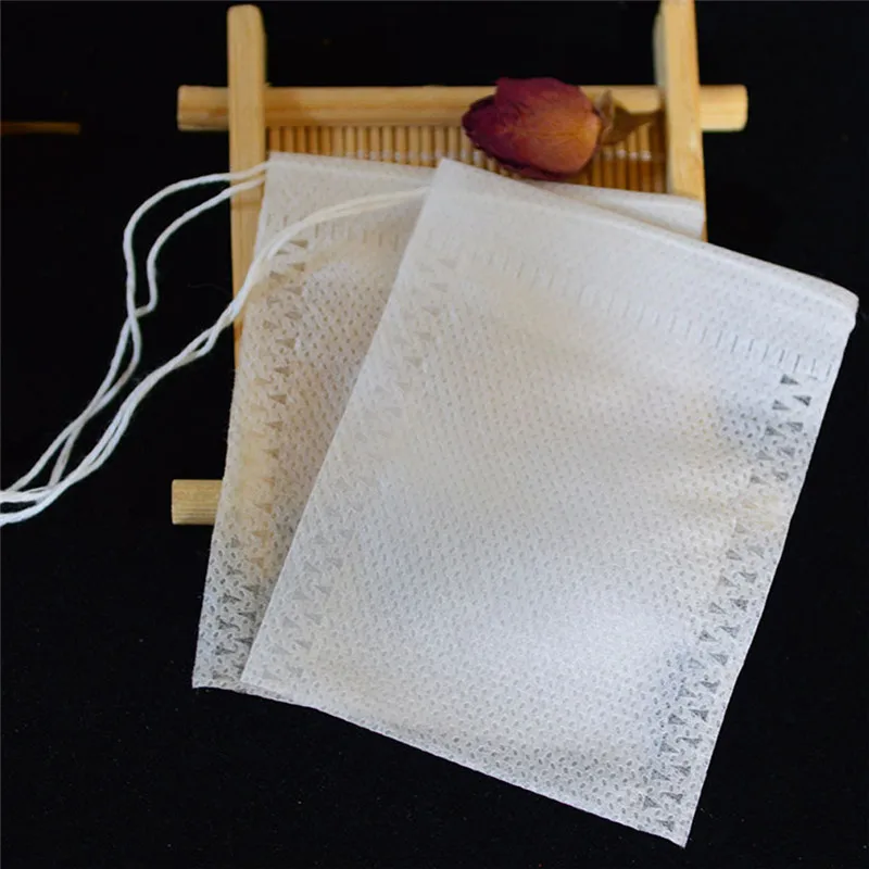 

Tea Bags 100Pcs/Lot Empty Scented Drawstring Pouch Bag 5*7CM Seal Filter Cook Herb Spice Loose Coffee Pouches Tools W3