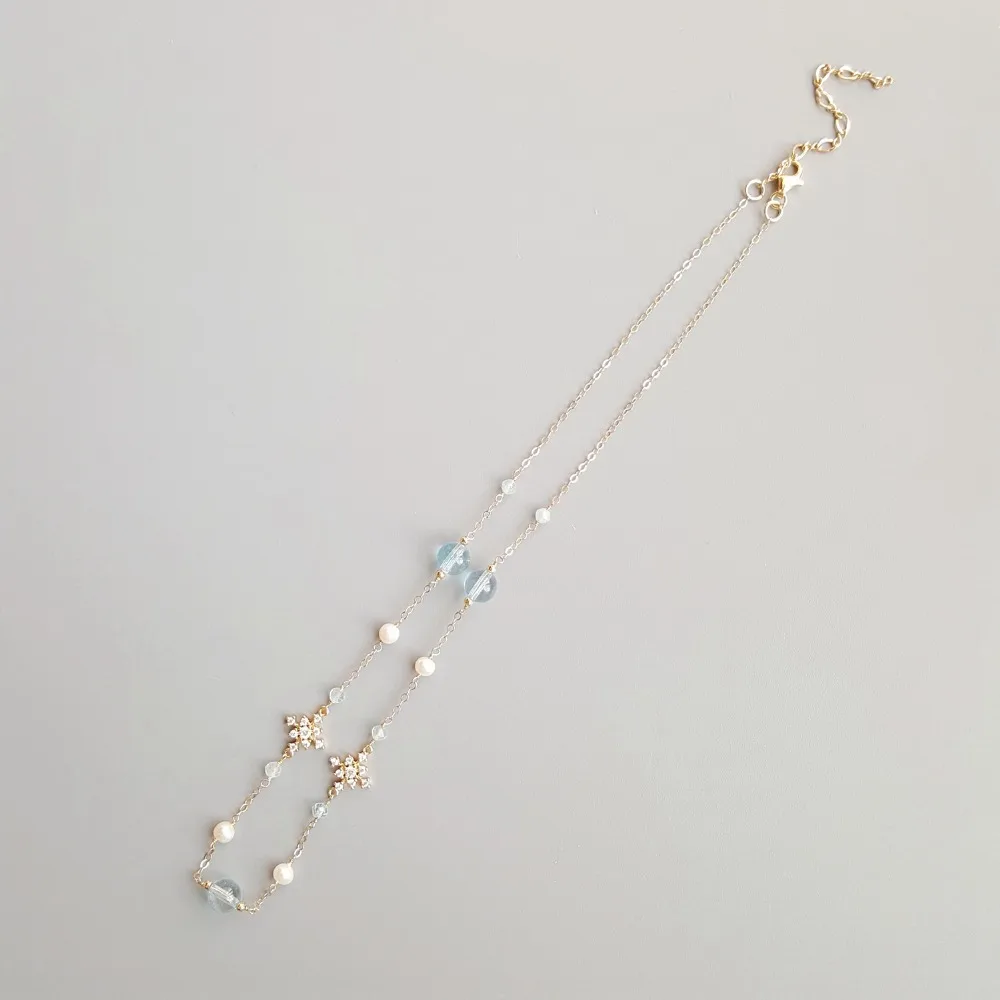 

Lii Ji Genuine Blue Topazs Zircon Snowflakes Necklace S925 Gold Color Delicated Handmade Necklace 40cm+4cm For Women